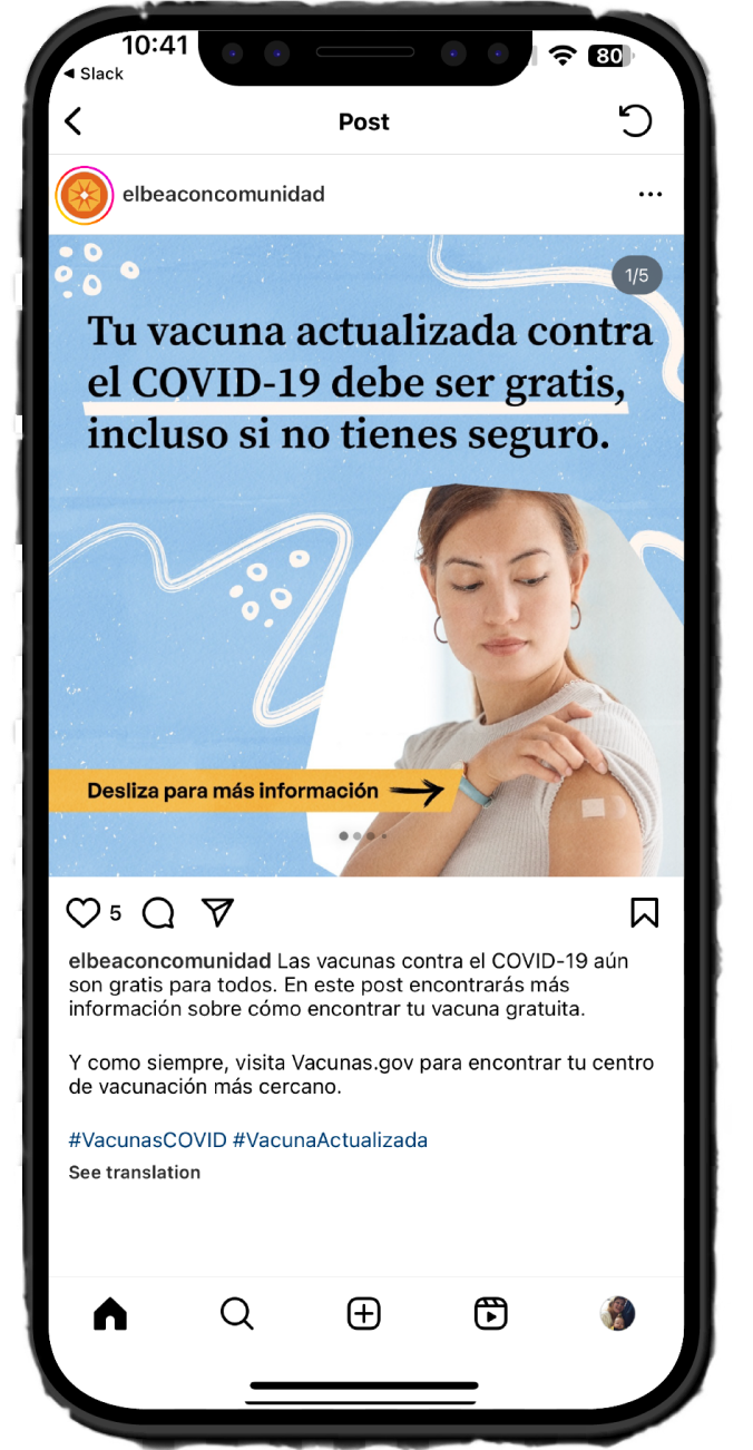 Image of a phone with the El Beacon website on the screen.